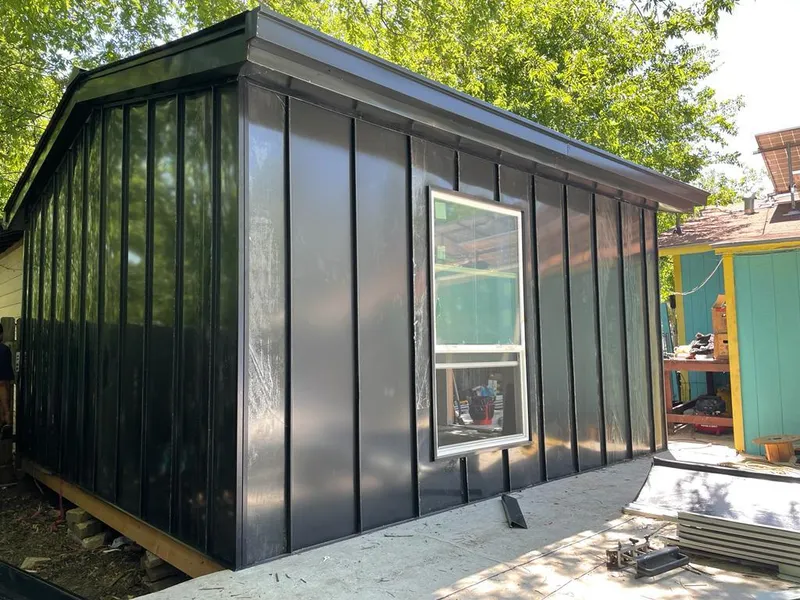 Black standing seam metal wall panels for Roof Inspection in Thibodaux
